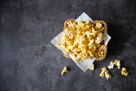 Popcorn on dark background.