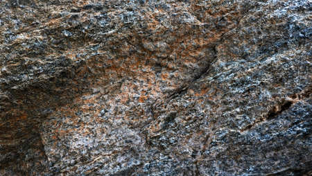 the texture of the river stone left by the roadside is the background for taking picturesの写真素材