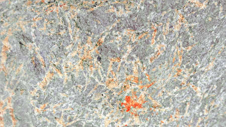 the texture of the river stone left by the roadside is the background for taking picturesの写真素材