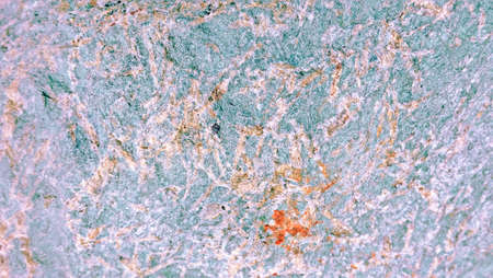 the texture of the river stone left by the roadside is the background for taking picturesの写真素材