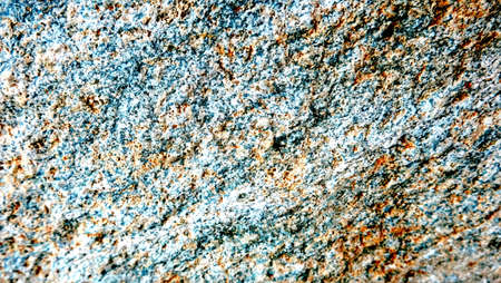 the texture of the river stone left by the roadside is the background for taking picturesの写真素材