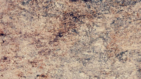 the texture of the river stone left by the roadside is the background for taking picturesの写真素材