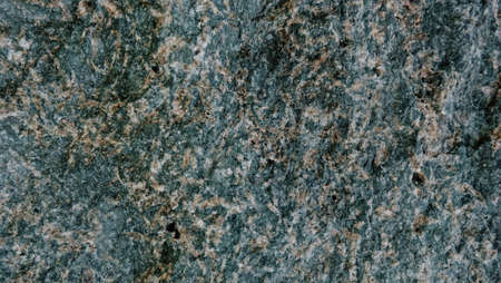 the texture of the river stone left by the roadside is the background for taking picturesの写真素材