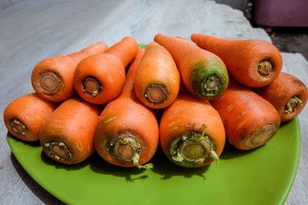 fresh carrots with beautiful colors,
Pile of fresh carrots with beautiful colors from shopping at the marketの写真素材