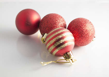 red, Christmas decoration, balls, shine, bright,celebretion,joy, happiness, white backgroundの写真素材