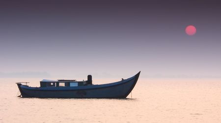 A boat and sunset in the Netherlandsの写真素材