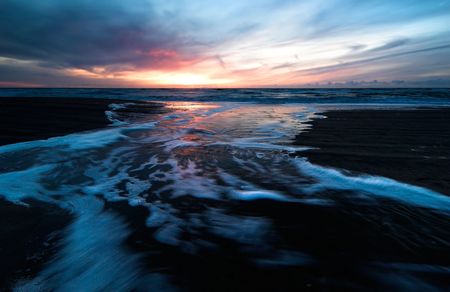 Sunset on the beachの写真素材