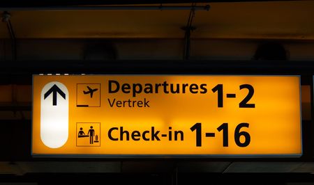 Departure sign at the airportの写真素材