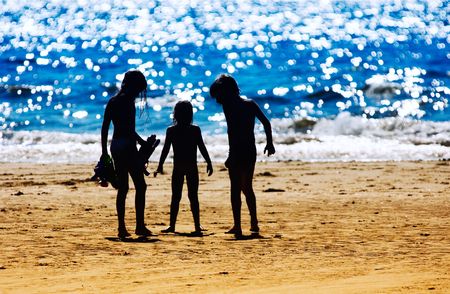Kids on the beach in summerの写真素材