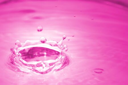 Waterdrop seen through a macro lens with lemonade colorの写真素材