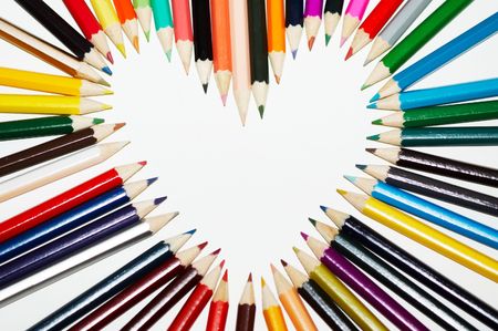 Colored pencils in a heart shapeの写真素材
