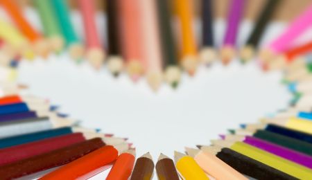 Colored pencils in a heart shapeの写真素材