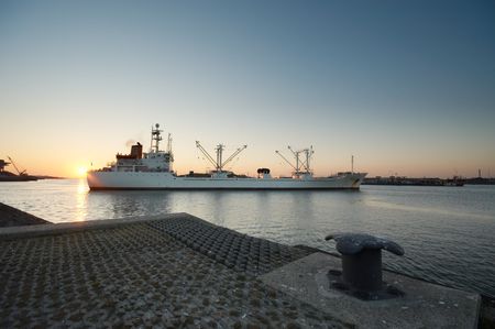 boat and sunset in harborの写真素材