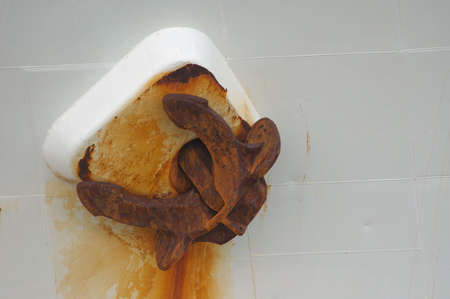 Abstract photo of a rusty anchor from a big shipの写真素材