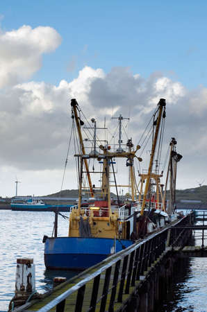 fishing ships in the harborの写真素材
