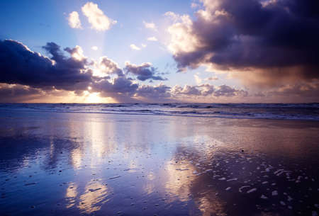Ocean and sunset at night
