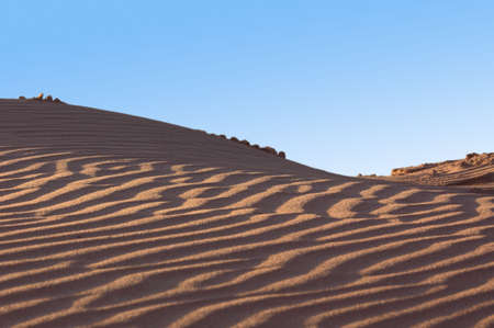sand dunes and a blue skyの写真素材