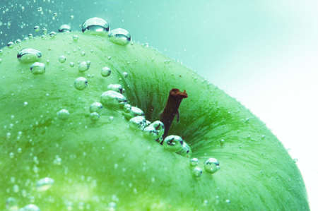 fresh green apple and water bubblesの写真素材