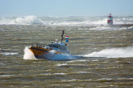 a pilot boat in a stormの写真素材