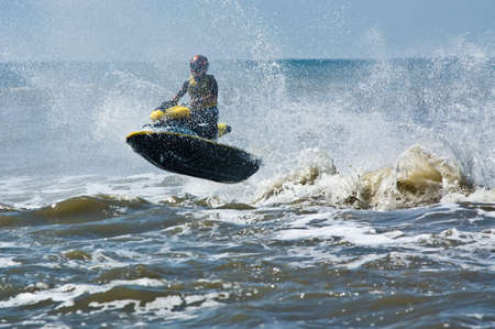 extreme  jet-ski watersports with big waves