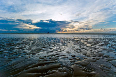 Beautiful sunset and waves on the beach