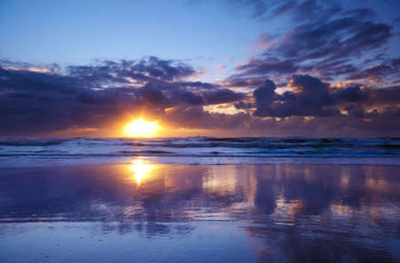 waves and sunset on the beach