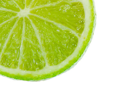 fresh lime isolated on whiteの写真素材