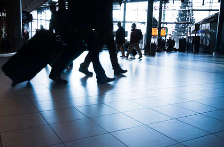 people traveling at the airport ( motion blur)のeditorial素材