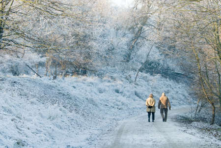 senior couple walking on a beautiful day in winter の写真素材