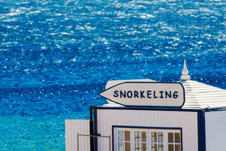 snorkeling sign in egypt with turquoise water backgroundの写真素材