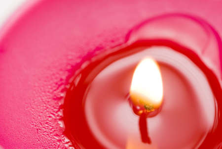 trendy bight pink candle and flameの写真素材