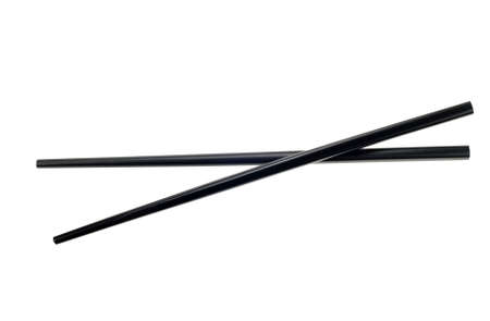black chop sticks isolated on a white backgroundの写真素材