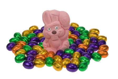cute easter bunny surrounded by easter eggs isolated on a white background