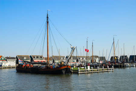 old dutch houses and boats in Marken a small village near Amsterdamの写真素材