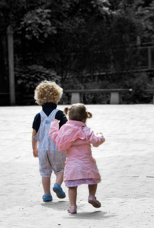 small boy and  girl on adventure( Black and white background) の写真素材