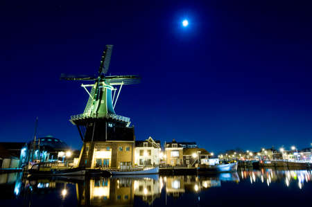 windmill and moonlight in Haarlem the netherlandsの写真素材