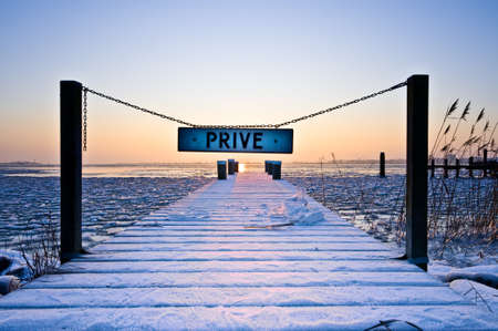 dutch winter landscape with private signの写真素材