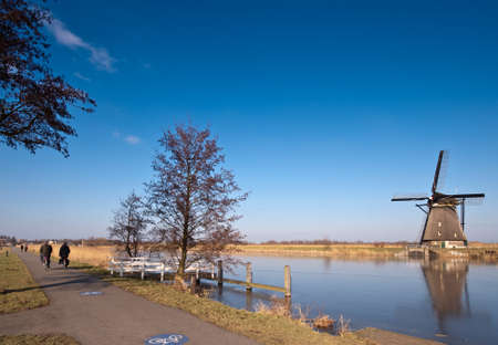 beautiful windmill landscape at kinderdijk in the netherlands near Rotterdamの写真素材