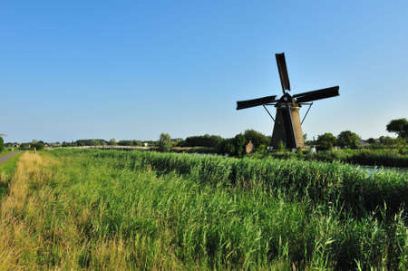 beautiful windmill landscape at kinderdijk in the netherlands near Rotterdamの写真素材