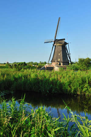 beautiful windmill landscape at kinderdijk in the netherlands near Rotterdamの写真素材