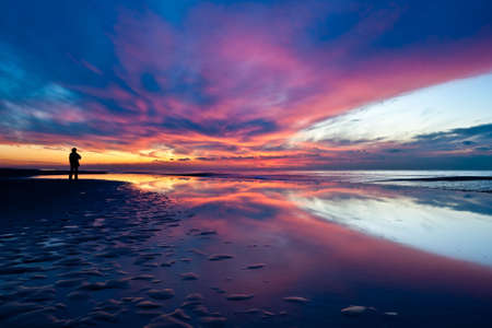wild sunset at the dutch coast in callantsoog the Netherlandsの写真素材