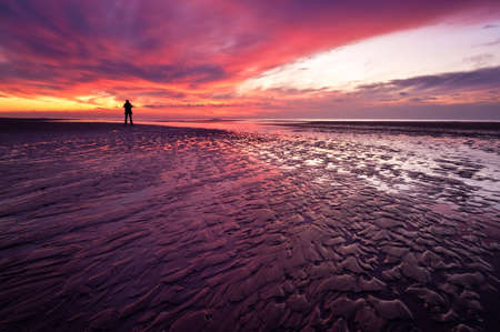 wild sunset at the dutch coast in callantsoog the Netherlandsの写真素材