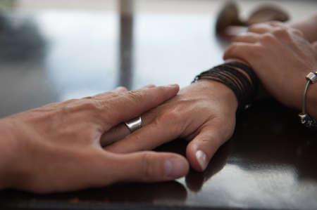 Man and Woman holding handsの写真素材