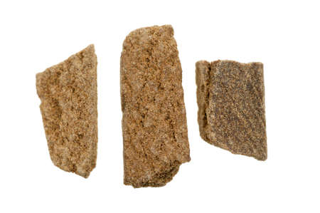 pieces of hashish, Photo taken with a macro lens,  isolated on a white background
の写真素材