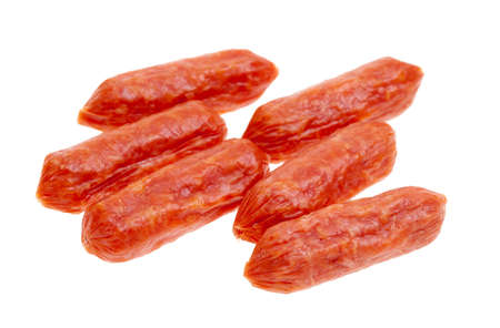 small spicy salami snacks isolated on a white backgroundの写真素材
