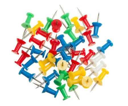 lots of pushpins in different colors isolated on a white backgroundの写真素材