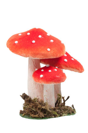 red dotted decoration mushrooms isolated on a white backgroundの写真素材