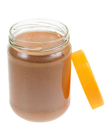 Jar of peanut butter isolated on a white backgroundの写真素材
