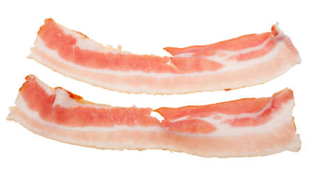 pieces of raw bacon isolated on a white backgroundの写真素材