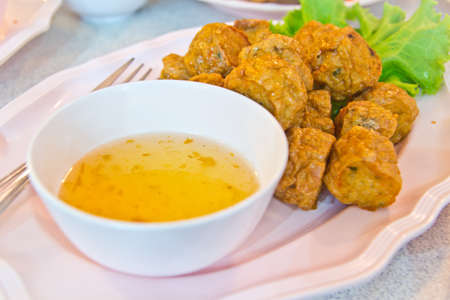 Spicy fried fish ball , Thai style foodの写真素材